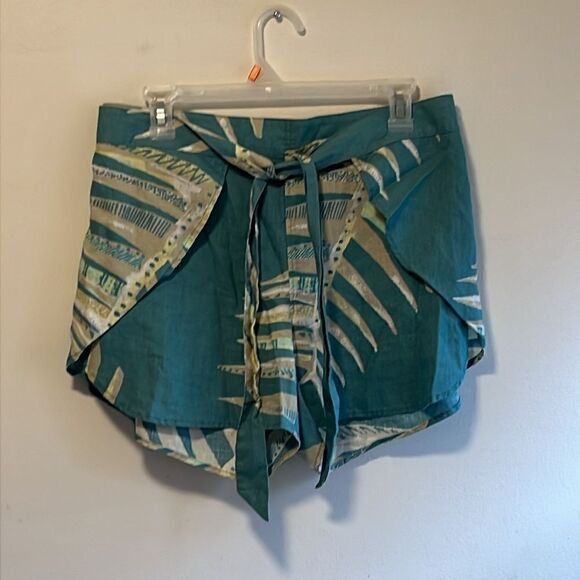 EXCELLENT CONDITION WOMEN’S MEDIUM PATAGONIA “WRAPAROUND” GARDEN ISLAND 4” SHORT - Picture 6 of 9